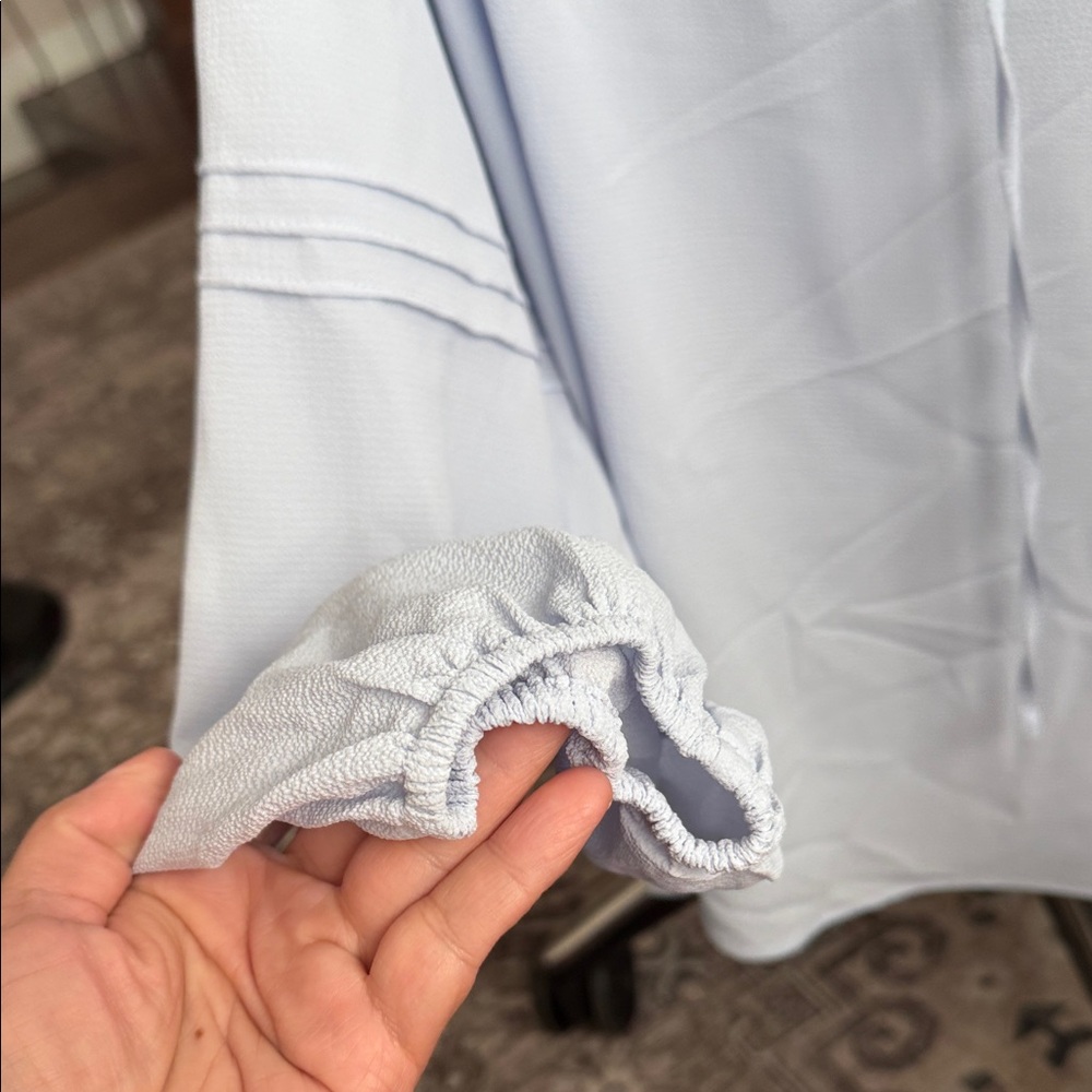 Elegant Light Blue Smocked Neck Blouse - Picture 7 of 15